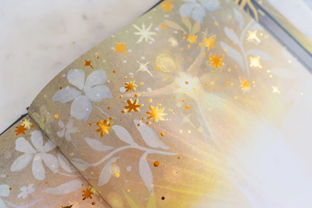 Stunning hand-painted illustrations, finished with gold foil